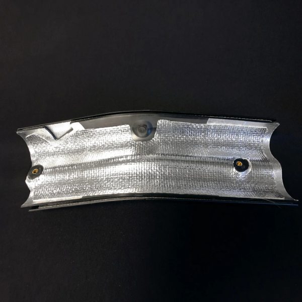 Under seat heat shield application area requiring an exhaust heat shield liner for heat management.