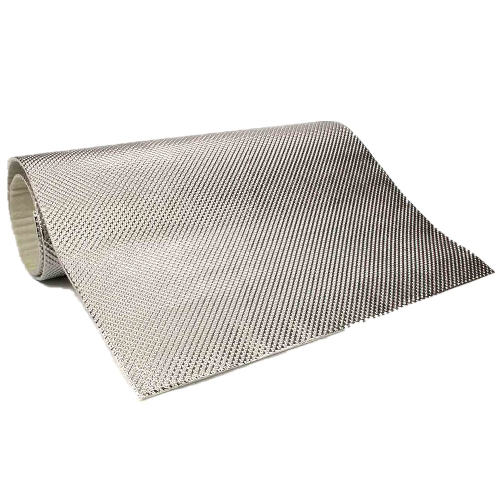 How does an adhesive backed aluminized heat barrier protect automotive components?