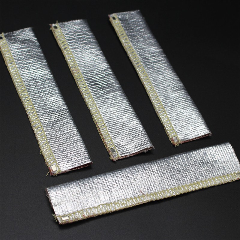 What is the purpose of a Spark Plug Wire Heat Shield?
